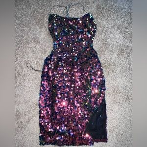 A black sequin fashion nova dress. Size small.